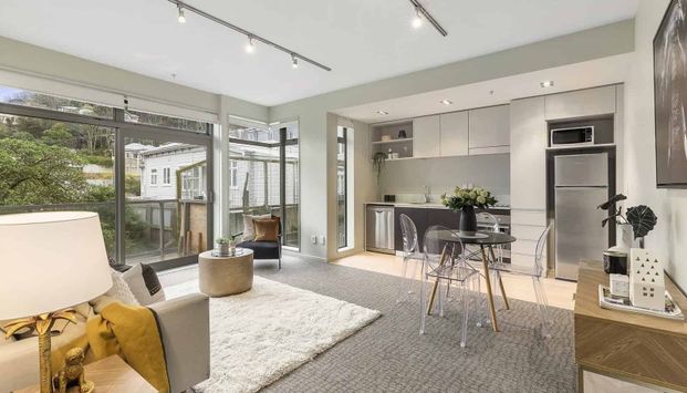 Welcome to apartment E108 in Revolucion Apartments. - Photo 1