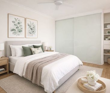 Nicely updated, top floor residence with a lock up garage & storeroom - Photo 2