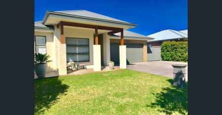 COASTAL EXCELLENCE IN BAYSWOOD- Fully Furnished - Photo 2