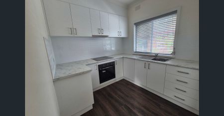 Renovated 1-Bedroom Unit in Central Location - Photo 3