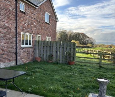 3 Cwrt Bryn Cwnin is a mid terrace three bedroom barn conversion si... - Photo 6
