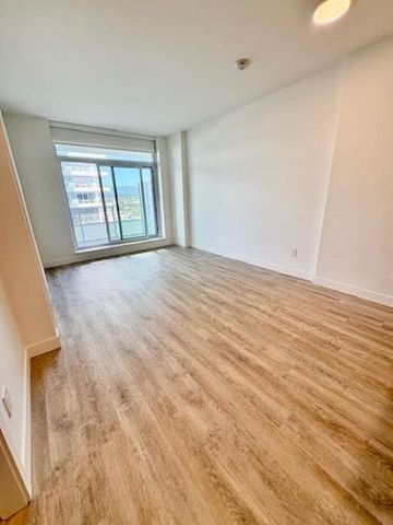 7th Floor – 1 Bedroom PLUS Large Den – NEW! - Photo 2