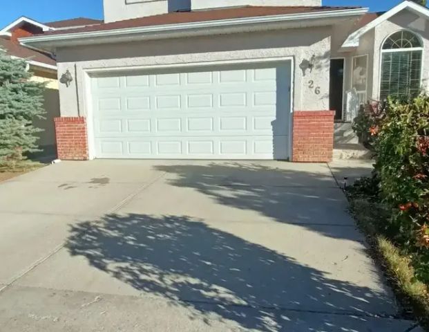 2 Bedroom Walkout Basement, with 1 Bath, living room and kitchen. | 26 Arbour Crest Close Northwest, Calgary - Photo 1