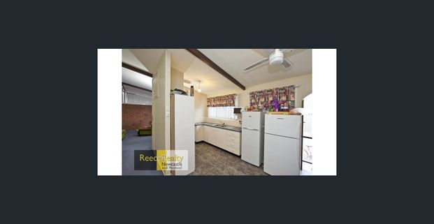 CLOSE WALK TO UNIVERSITY - Photo 1