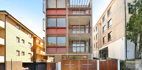 Modern two bedroom unit - 20% below market rent - Photo 2