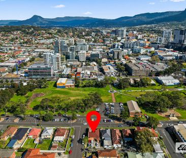 Central 4-Bedroom Home – Walk to Wollongong CBD - Photo 1