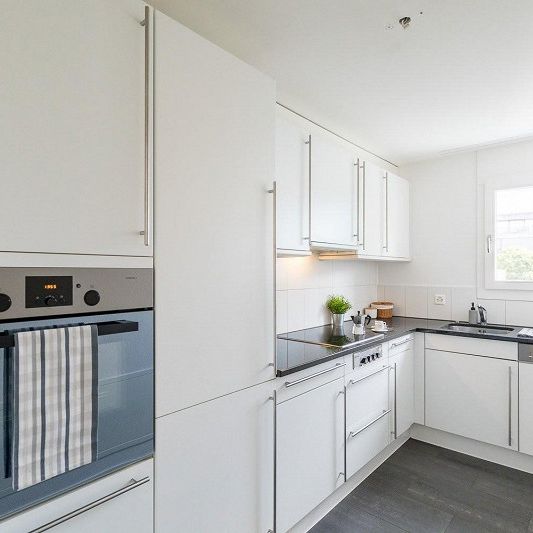 Schöne, moderne 4.5 Zimmerwohnung an zentraler Lage - Foto 1