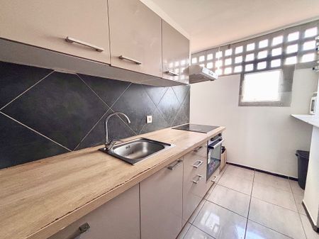 Location Appartement 4 pièces 82m² LES ABYMES 97139 - Photo 4