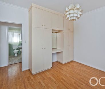 Open the Door To Effortless Living in a Central Western Location - Photo 1