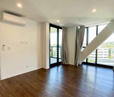 Elevated Living with Gym, Rooftop & Unbeatable... - Photo 4