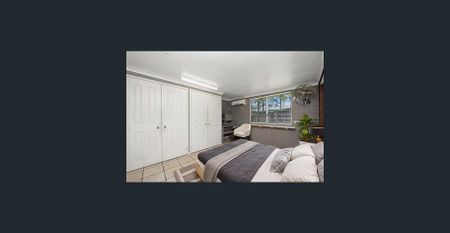 Spacious Family Retreat with Dual Living Areas and Prime Location - Photo 5