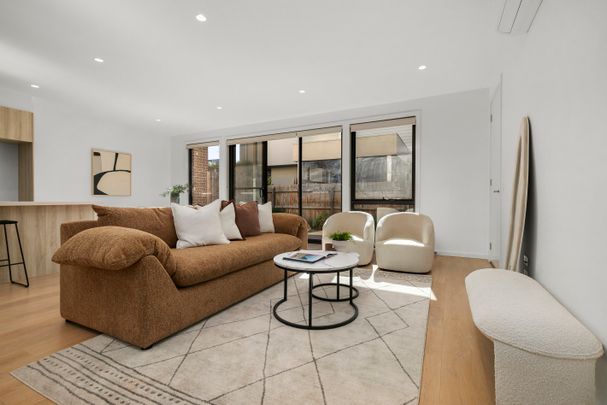 A Refined Townhouse Offering Lifestyle, Comfort and Location - Photo 1