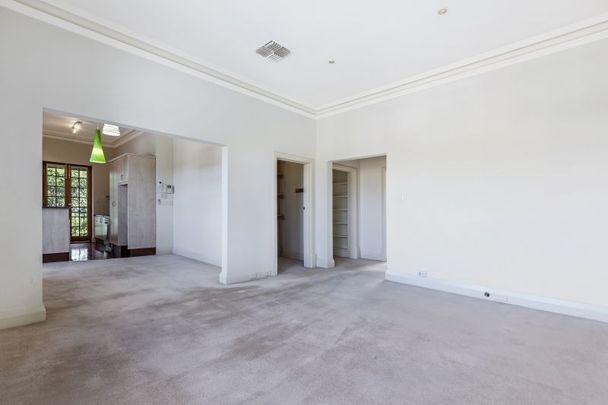 Top-Floor Living with Park Views & Incredible Convenience - Photo 1