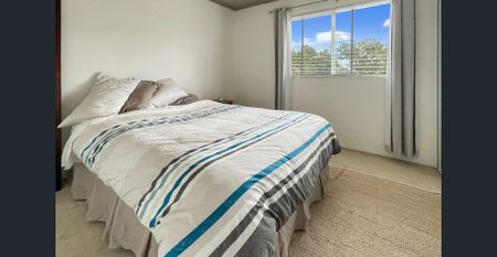 Updated two bedroom apartment with garage - Photo 3