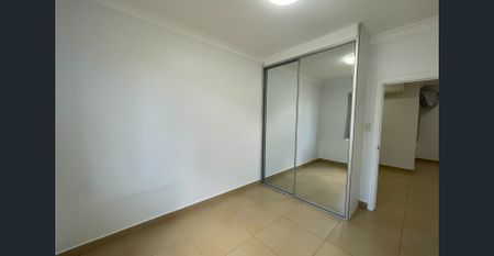 Spacious 4-Bedroom Home with Separate Retreat - Photo 3