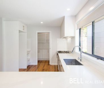 Renovated Family Home with Secure Backyard - Photo 6