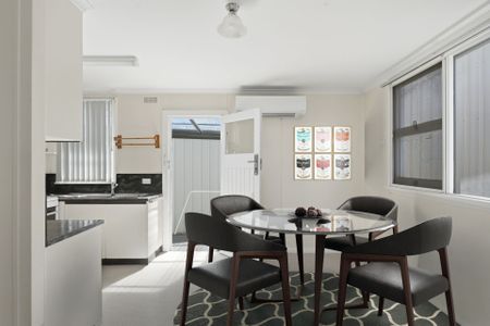 Neat & Practical Home with Secure Parking - Photo 3