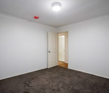 BRIGHT & COMFORTABLE HOME IN SOUGHT-AFTER LOCATION - Photo 1