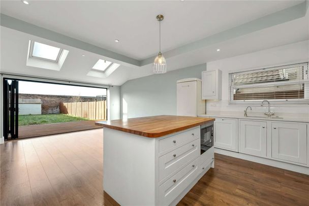 Four-bedroom home set on a private road, offering a harmonious blend of period character and contemporary style. Located within easy reach of local amenities, and excellent transport links. - Photo 1