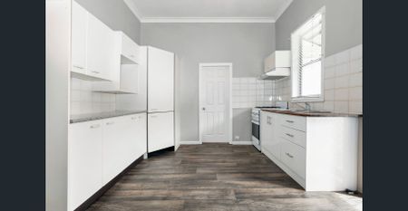 Character filled home on a level sunny block - Photo 3