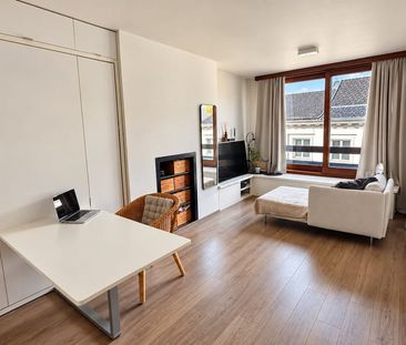 Appartement te huur - foto 1