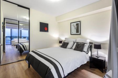 Modern 2 Bedroom Furnished Apartment with Stunning City Views - Photo 4