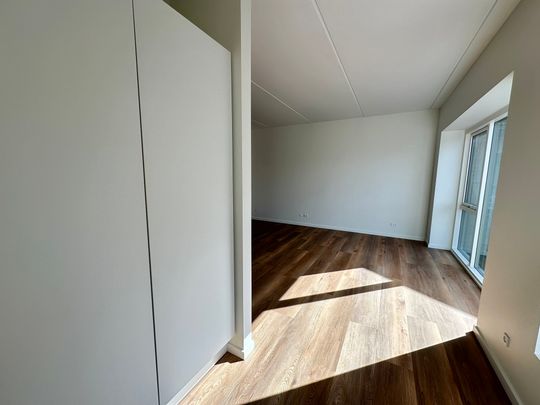 Delevenlig 3-værelses lejlighed i Stigsborg med altan - Foto 1