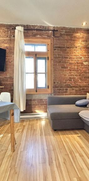 Loft entièrement meublé à louer Vieux-Québec mai 2026 - Photo 1