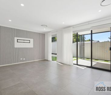 Sleek & Modern 3×2 Home with Secure Double Garage - Photo 2