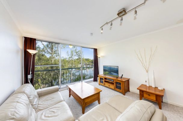 Fully Furnished Apartment with Water Views - Photo 1
