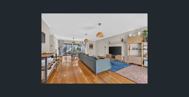 Spacious 3-Bedroom Unit with Modern Features and Double Garage - Photo 1