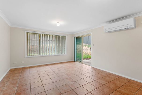 Low-maintenance living just moments from the CBD - Photo 1