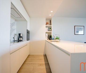 Dit prachtige appartement op het 4de verdiep van residentie “One Baelskaai” in Oosteroever, Oostende, heeft veel te bieden voor wie op zoek is naar een leuke plek om te wonen. - Foto 4