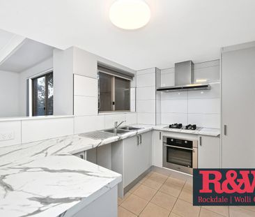 Bright & Modern 2-Bedroom Apartment in the Heart of Rockdale - Photo 3