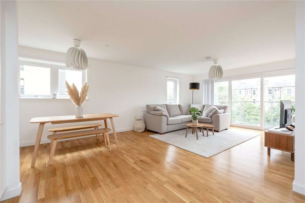 A stunning two bedroom furnished flat with two bathrooms at The Engine Yard Development, situated off Leith Walk. - Photo 1