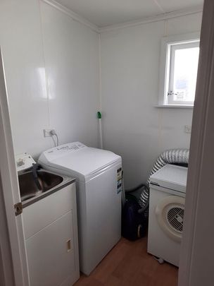 Tidy 4 Bedroom home plus free weeks rent - Photo 1