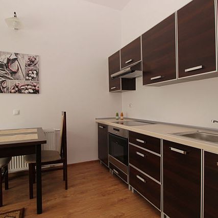 Kawalerka z ogródkiem na nowym osiedlu. - Zdjęcie 1