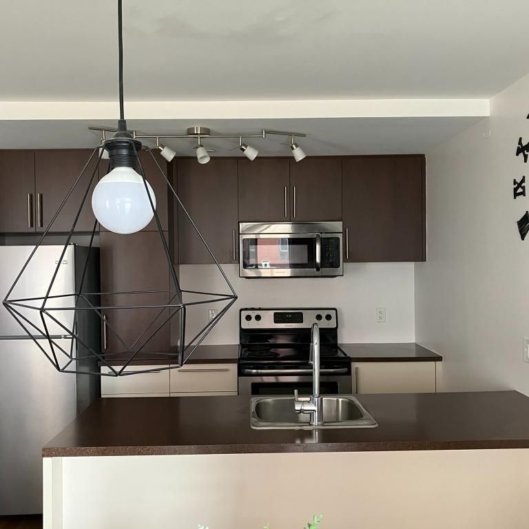 3 1/2 -condo Urbania-1er juin - Photo 1