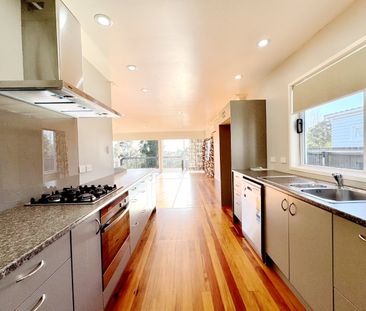 Spacious Home with Sunny Deck & Lawn Included - Photo 6