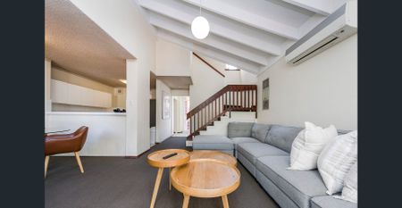 Partially Furnished Townhouse Retreat in Sought-After Como - Photo 4