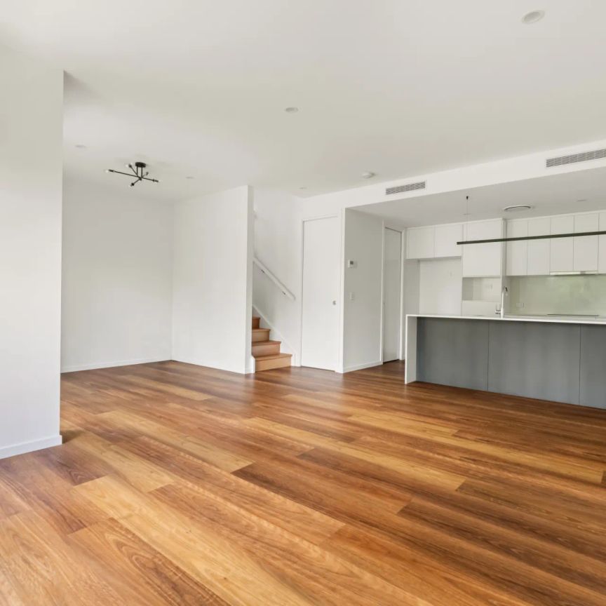 Premium Architect-Styled Four-Bedroom Townhouse - Photo 1