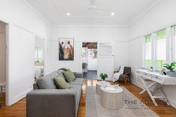 Comfortable 3-Bedroom Home in Convenient Berserker Location - Photo 1