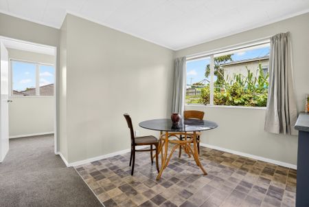 RENOVATED AND LOOKING SMART! - Photo 3