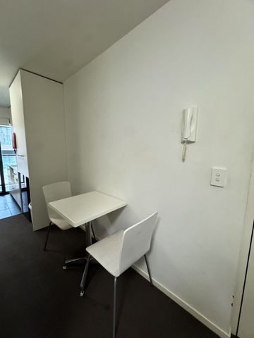 Fully Furnished 1-Bedroom Apartment with Study and Balcony - Photo 2