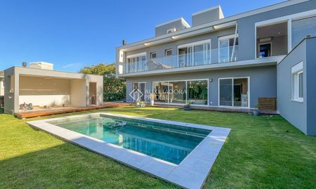 Casa em Condomínio com 4 quartos e 431m² para alugar em Rio Tavares, Florianópolis. - Foto 4