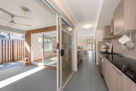 Your Dream Oasis Awaits - Perfectly Positioned in the Gainsborough Greens Estate! - Photo 2