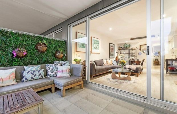 Stunning Split-Level Warehouse Conversion with Bay Views & Luxe Space - Photo 1