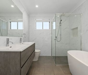 Modern Luxury with Multiple Living Zones & Low-Maintenance Backyard - Photo 4