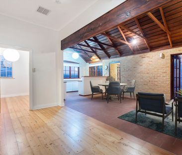 CHARACTER HOME WITH AN UPLIFT - Photo 1