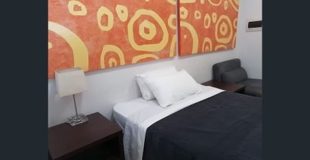 Central location fully furnished self contained studio apartment - Photo 4